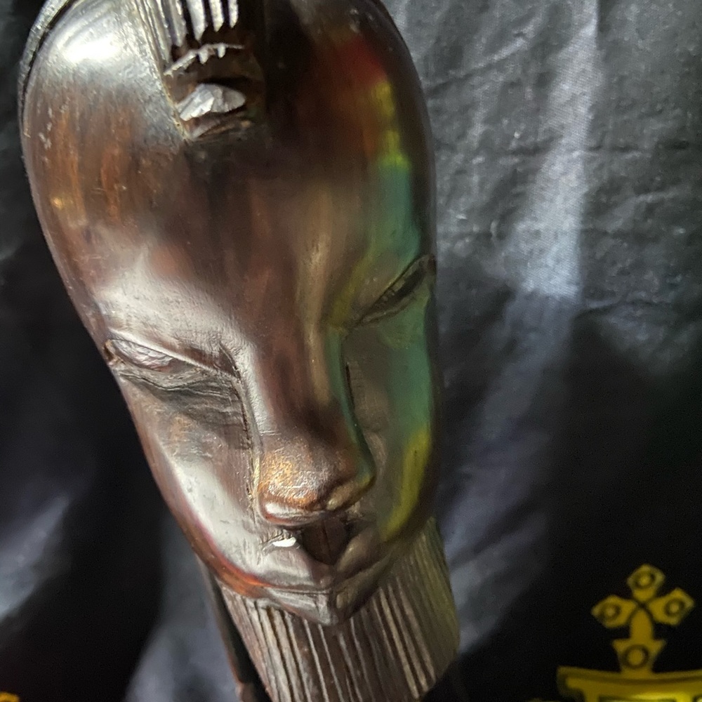 Carved wooden head